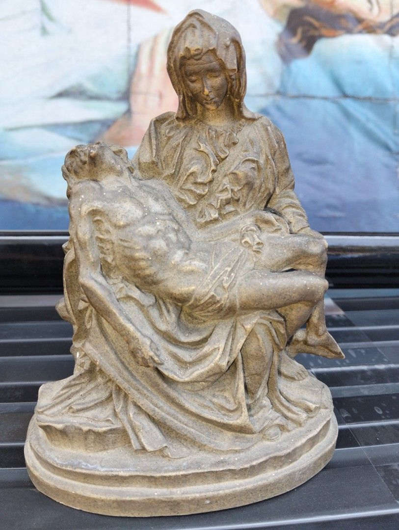 Pieta Statue Sculpture Religious Art (Category: Other Home Decor) located in Manila. Submitted by raymundm36884 (Listing ID 1463250441, Image 3). Description: - Pieta religious statue: Mary holding the body of Jesus. - Features a weathered, antique aesthetic. - Approximately 7 inches tall. - Ideal for home altars or display shelves. - A meaningful devotional piece..