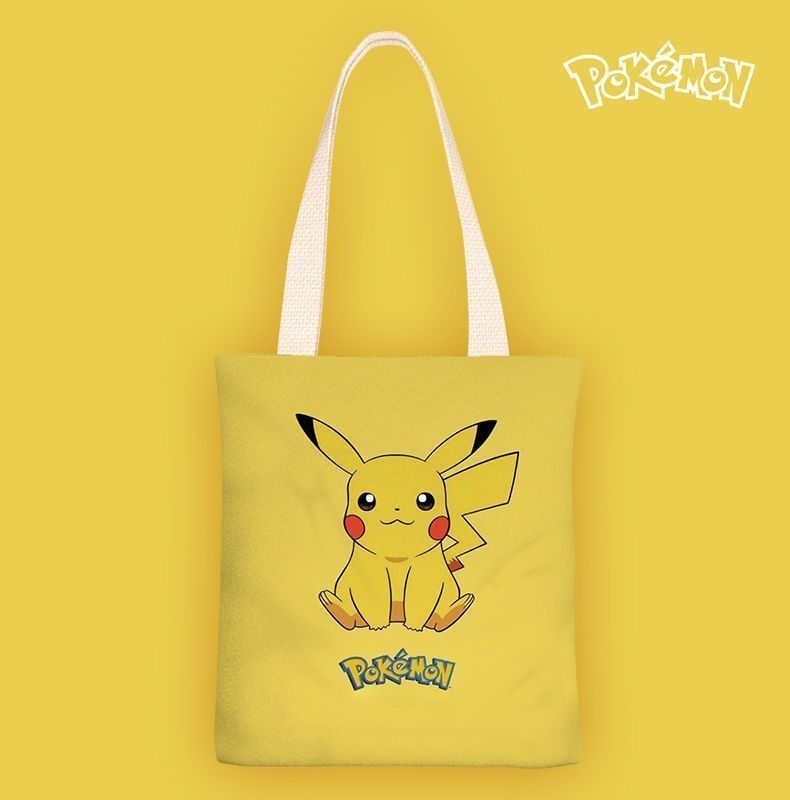 Pikachu Pokemon Themed Canvas Tote Bag (Small) (Category: Tote Bags) located in Taguig. Submitted by realmshop (Listing ID 1463186613, Image 1). Description: Pikachu Pokemon Themed Canvas Tote Bag (Small) 🌟"Pika-Pika!" Add a jolt of joy and practicality to your everyday carry! 🌟 Whether you’re heading to class, catching Pokémon in the park, or running your weekly errands, this Pikachu Canvas Tote Bag is your ultimate companion. Featuring the wo