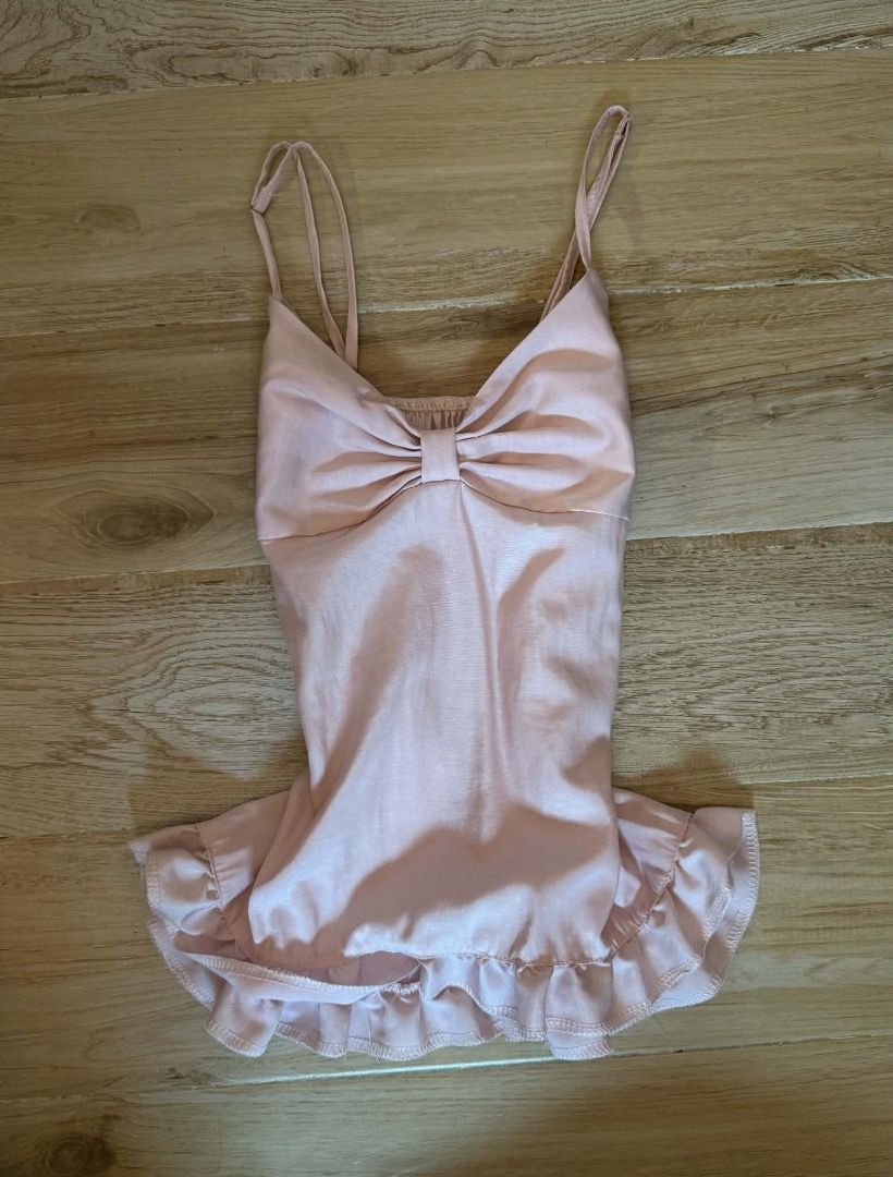 Pink Bow Cami Top with Ruffle Hem (Category: Sleeveless) located in Caloocan City. Submitted by ysavmrz (Listing ID 1463207408, Image 1). Description: good condition, washed mop: gcash mod: j&t size: XS-S.