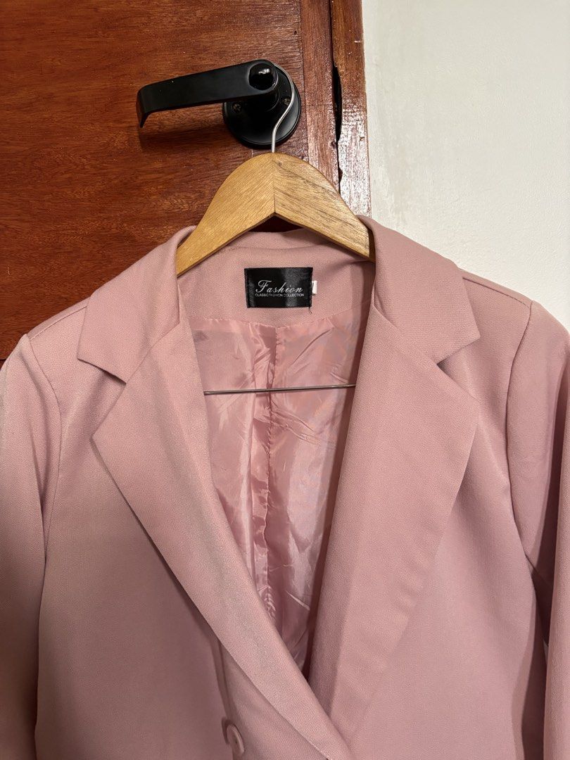 Pink Double-Breasted Blazer (Category: Coats, Jackets and Outerwear) located in Taguig. Submitted by cftbncs (Listing ID 1463176560, Image 3). Description: - Stylish pink double-breasted blazer - Two front buttons - Two functional pocket flaps - Fully lined with matching pink fabric - Versatile for casual or formal wear - Easy to style with various outfits - Ideal for layering.