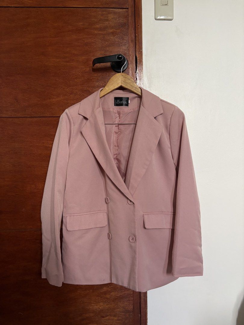 Pink Double-Breasted Blazer (Category: Coats, Jackets and Outerwear) located in Taguig. Submitted by cftbncs (Listing ID 1463176560, Image 1). Description: - Stylish pink double-breasted blazer - Two front buttons - Two functional pocket flaps - Fully lined with matching pink fabric - Versatile for casual or formal wear - Easy to style with various outfits - Ideal for layering.