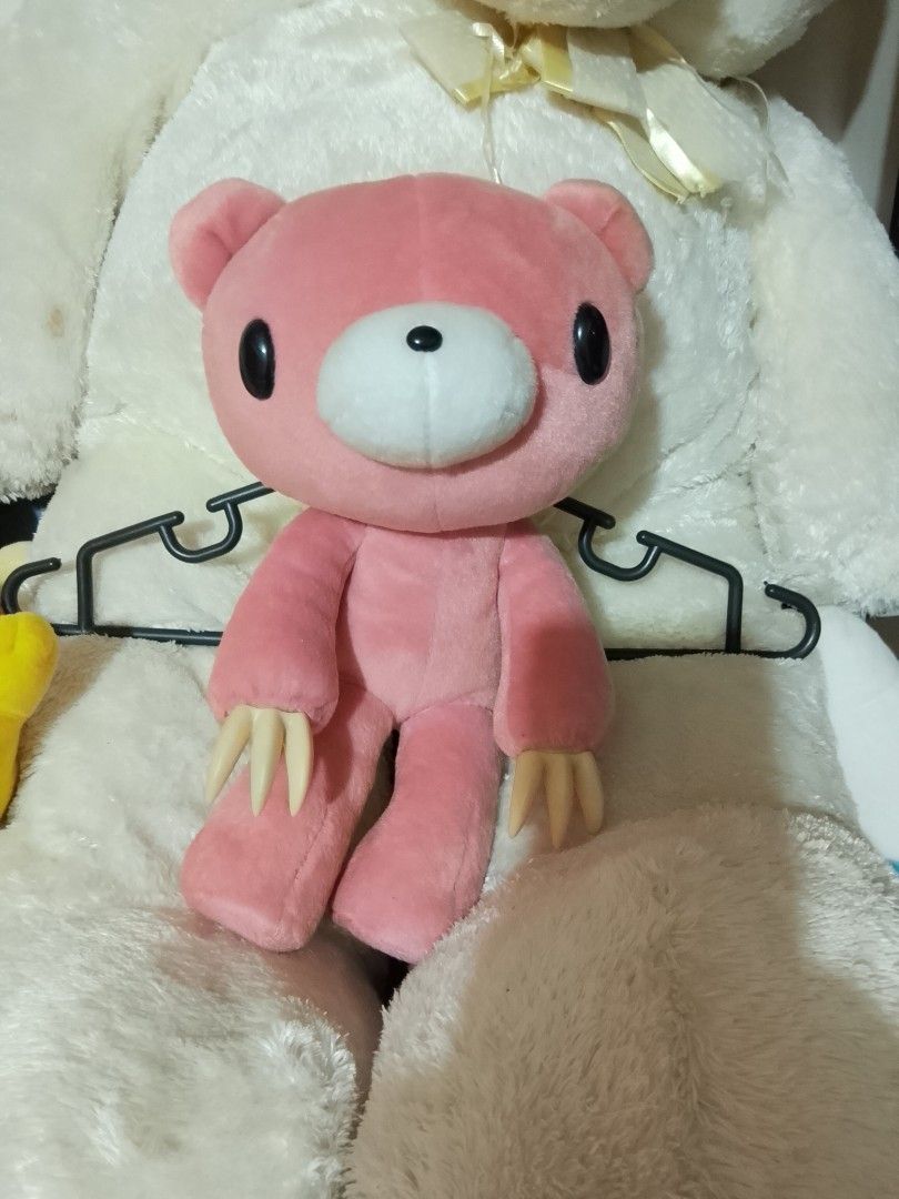 Pink Gloomy Bear Plush Toy (Category: Plushies & Soft Toys) located in Angeles City. Submitted by yourtrovejapansurplus (Listing ID 1463254184, Image 1). Description: - Adorable pink Gloomy Bear plush toy. - Approximately 10 inches in height. - Features the character's iconic signature claws. - Ideal collectible for Gloomy Bear fans. - No significant flaws or damage noted..