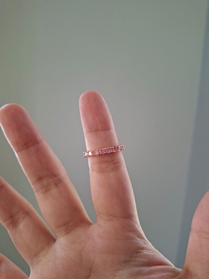 Pink Stones Full Eternity Ring Size 7 (Category: Rings) located in Dasmarinas. Submitted by danabrie22 (Listing ID 1463217107, Image 2). Description: size 7 very well-made, excellent crafstmanship 10/10 condition brand new stainless steel &bubble gum pink -colored cubic zirconia stones made in Hongkong.