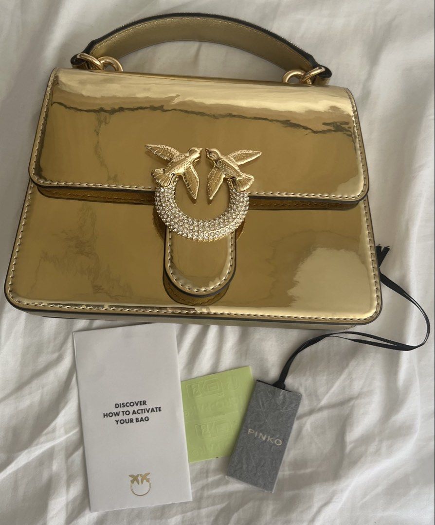 Pinko Love Bag in Gold (Category: Cross-body Bags) located in Manila. Submitted by zellie11 (Listing ID 1463186965, Image 1). Description: Brandnew As is in the photo No box or dustbag.