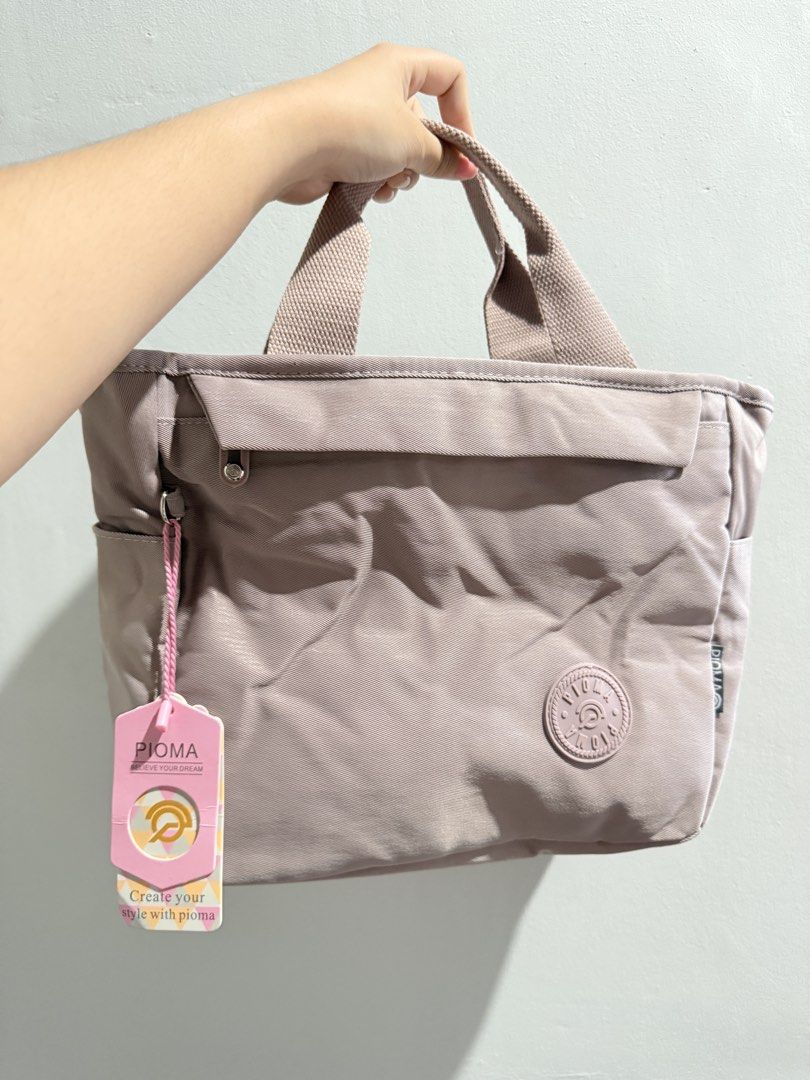 Pioma Tote Bag - Light Purple (Category: Tote Bags) located in Quezon City. Submitted by sleepycatperson (Listing ID 1463140609, Image 2). Description: - Cute Pioma tote bag - Light purple color - Front pocket with zip closure - insulated thermal bag - can send more pictures - bought for 777.