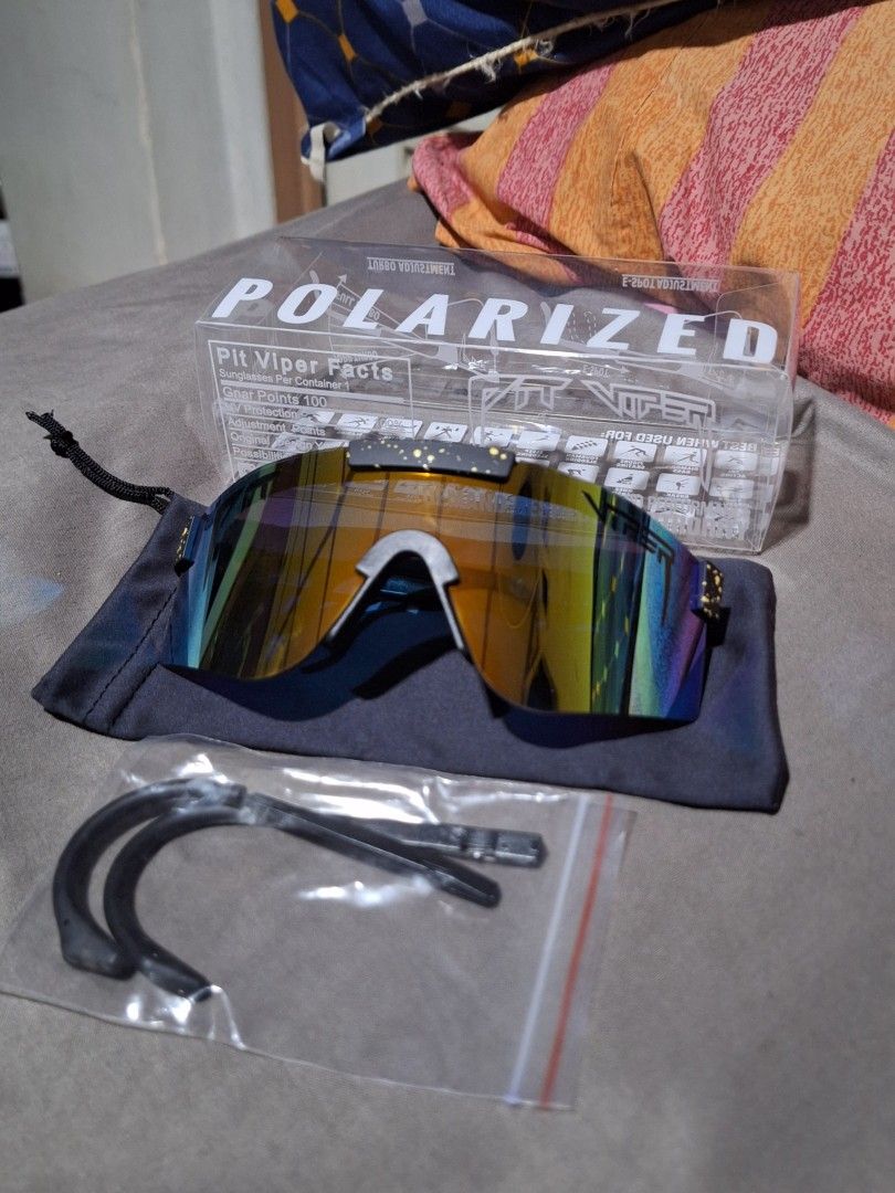 Polarized Sunglasses with Case and Accessories (Category: Sunglasses & Eyewear) located in Caloocan City. Submitted by rectooangelo (Listing ID 1463145940, Image 2). Description: - polarized sunglasses - Includes case and pouch - Mirrored and reflective lenses - Ideal for all outdoor activities 200 each .