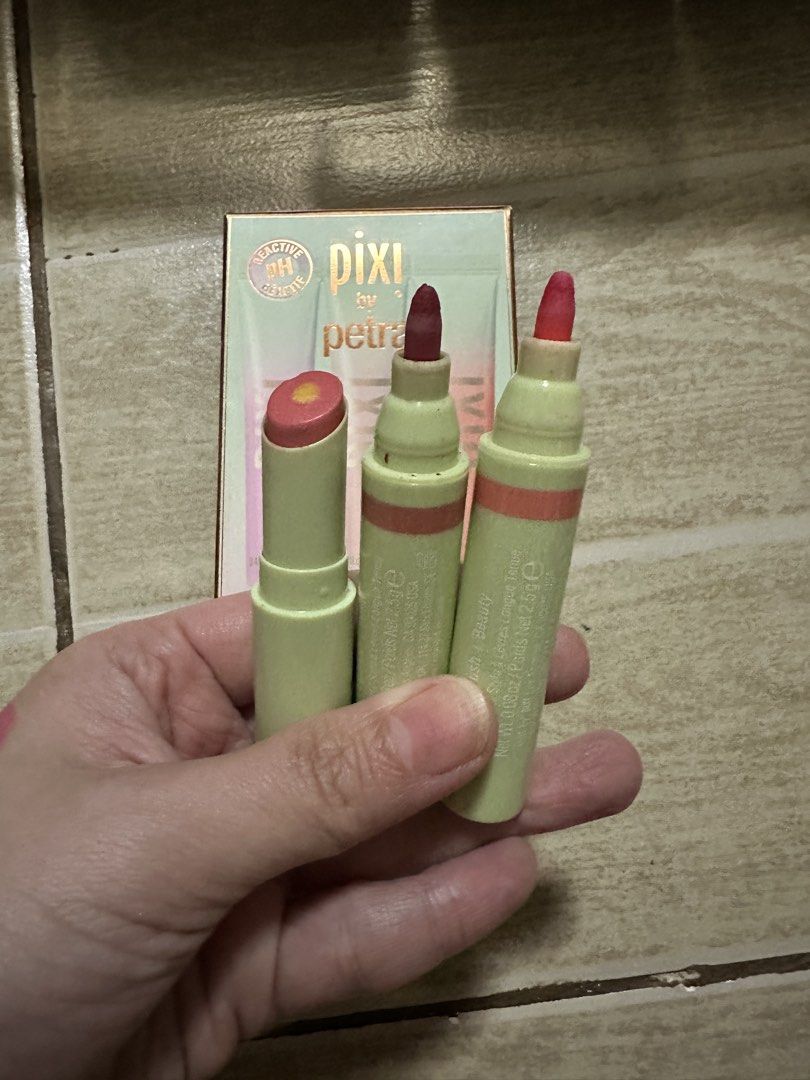 Pixi by Petra LipTone Trio pH Reactive Gloss Bundle (Category: Makeup) located in Quezon City. Submitted by faststone.ba186f (Listing ID 1463237629, Image 2). Description: - Pixi by Petra LipTone Trio - Set includes 2 pH reactive gloss shades - Each gloss customizes color based on your pH - Great for experimenting with different lip looks - Lip balm with Vitamin C - 2pcs lip stain shades: Purity and Beauty - Take all for p850.