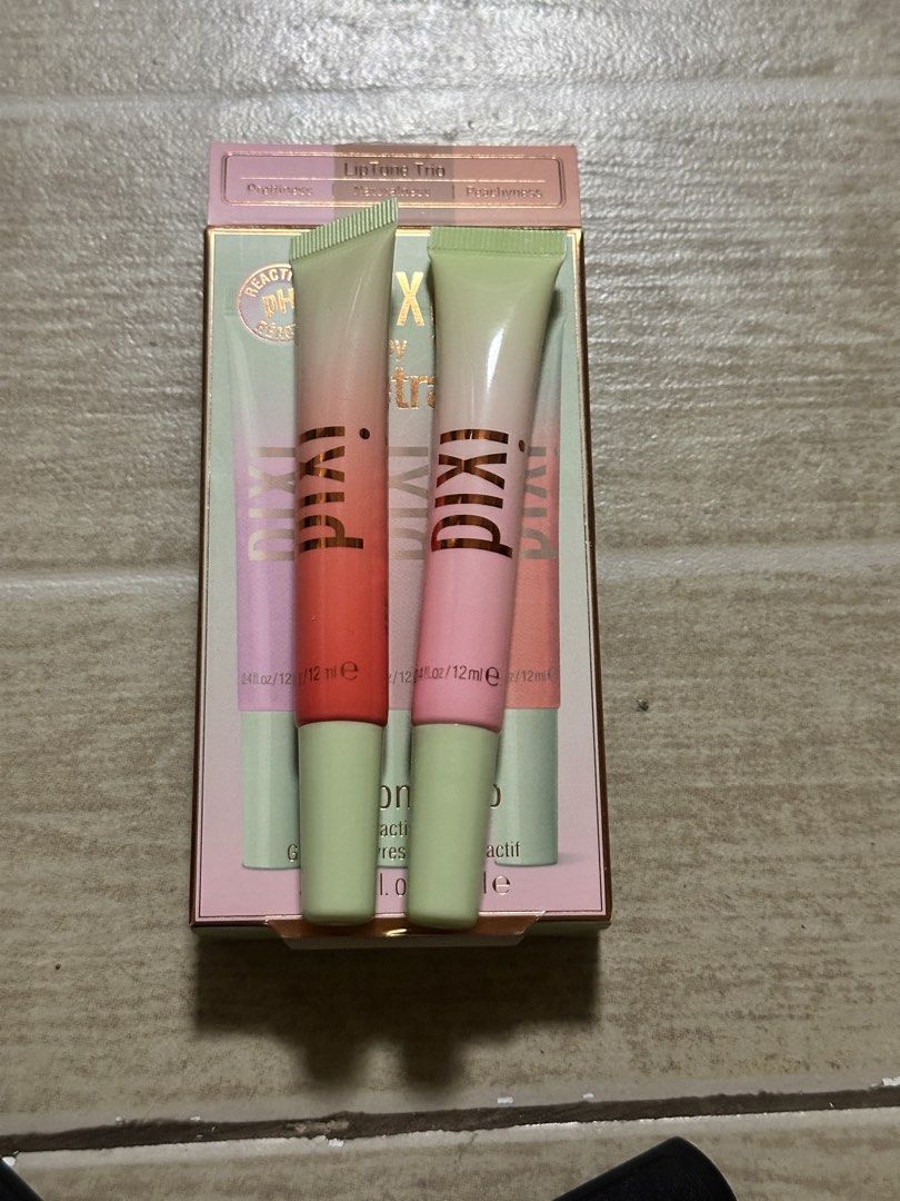 Pixi by Petra LipTone Trio pH Reactive Gloss Bundle (Category: Makeup) located in Quezon City. Submitted by faststone.ba186f (Listing ID 1463237629, Image 3). Description: - Pixi by Petra LipTone Trio - Set includes 2 pH reactive gloss shades - Each gloss customizes color based on your pH - Great for experimenting with different lip looks - Lip balm with Vitamin C - 2pcs lip stain shades: Purity and Beauty - Take all for p850.
