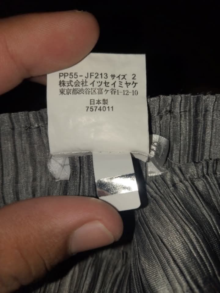Pleats Please Issey Miyake Pleated Pants Size 2 (Category: Other Bottoms) located in Lapu Lapu. Submitted by margaux099 (Listing ID 1463238612, Image 3). Description: - Authentic Pleats Please Issey Miyake Pants - Color: Grey - Size: 2 - Material: 100% Polyester - Features: Signature pleats, elastic waistband for comfort - Origin: Made in Japan - Style: Great for everyday wear.