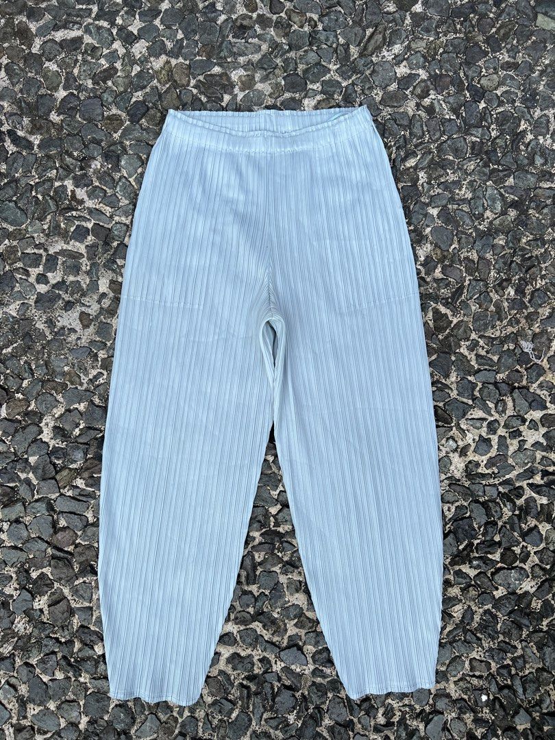 Pleats please Issey Miyake Slim cut Trouser (Category: Other Bottoms) located in Manila. Submitted by -handpick- (Listing ID 1463219905, Image 1). Description: These appear to be light blue pleated trousers featuring an elasticated waistband and vertical plissé detailing. Size : 2 Dimensions : Length : 34 Inseam : 23 Leg opening : 5.5 Knee : 10 Thigh : 12 Front rise :13 Waistline : 26 to 30 Sign of wear in good condition .