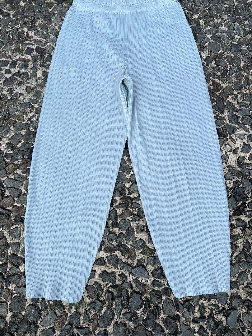 Pleats please Issey Miyake Slim cut Trouser (Category: Other Bottoms) located in Manila. Submitted by -handpick- (Listing ID 1463219905, Image 2). Description: These appear to be light blue pleated trousers featuring an elasticated waistband and vertical plissé detailing. Size : 2 Dimensions : Length : 34 Inseam : 23 Leg opening : 5.5 Knee : 10 Thigh : 12 Front rise :13 Waistline : 26 to 30 Sign of wear in good condition .