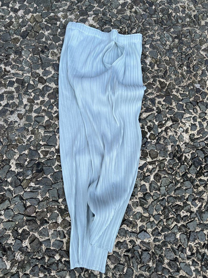 Pleats please Issey Miyake Slim cut Trouser (Category: Other Bottoms) located in Manila. Submitted by -handpick- (Listing ID 1463219905, Image 3). Description: These appear to be light blue pleated trousers featuring an elasticated waistband and vertical plissé detailing. Size : 2 Dimensions : Length : 34 Inseam : 23 Leg opening : 5.5 Knee : 10 Thigh : 12 Front rise :13 Waistline : 26 to 30 Sign of wear in good condition .