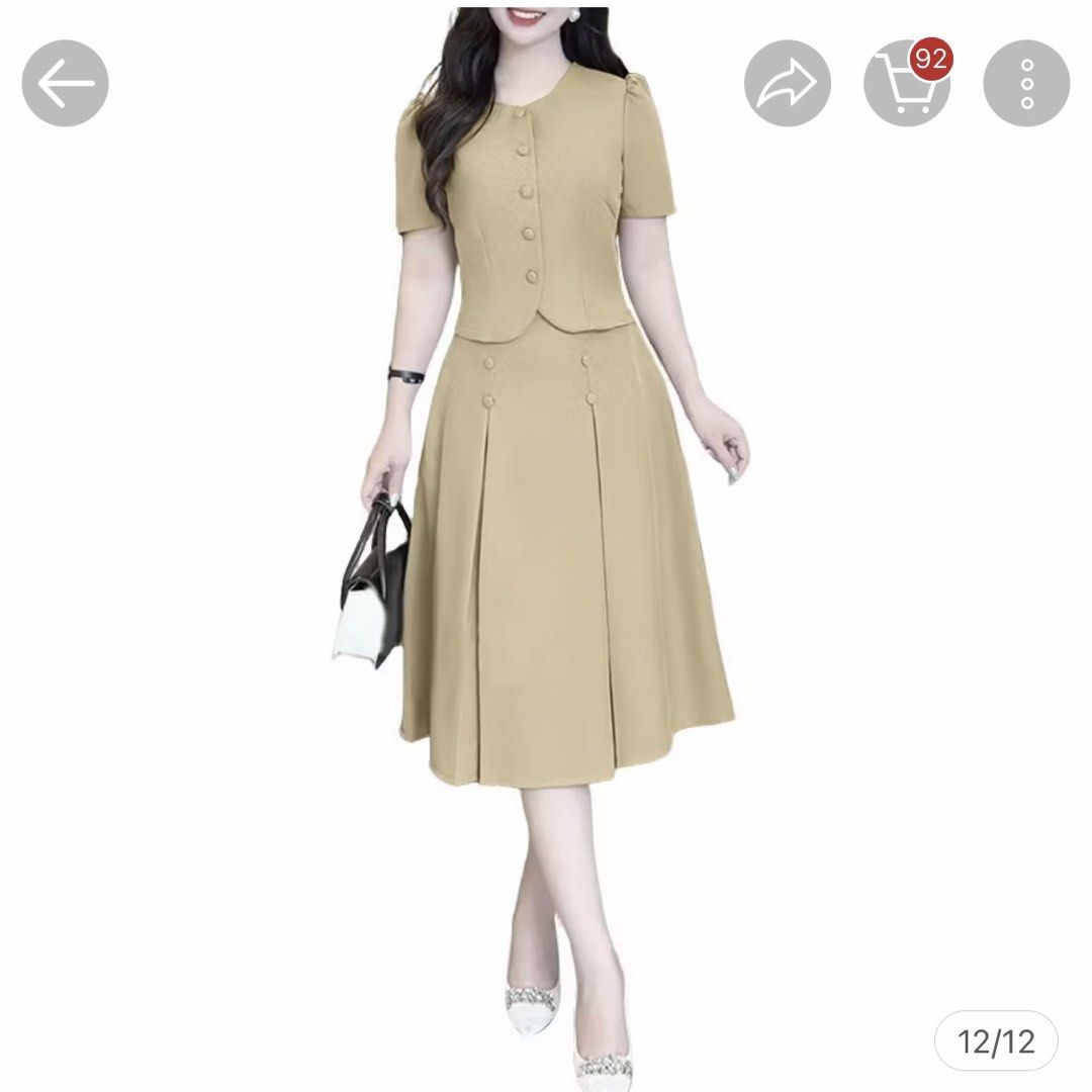 Plus size coordinates - skirt and blouse (Category: Sets or Coordinates) located in Manila. Submitted by mrgfp (Listing ID 1463265691, Image 1). Description: Worn once -perfect for 44-46 bust, 38-42 waist Selling a beige two-piece set from Zanzea. Includes a short-sleeve button-up top and a pleated midi skirt. Both pieces have button details. Great for work or casual wear. Check the size chart for measurements. Top has puff sleeves. Skirt has a c