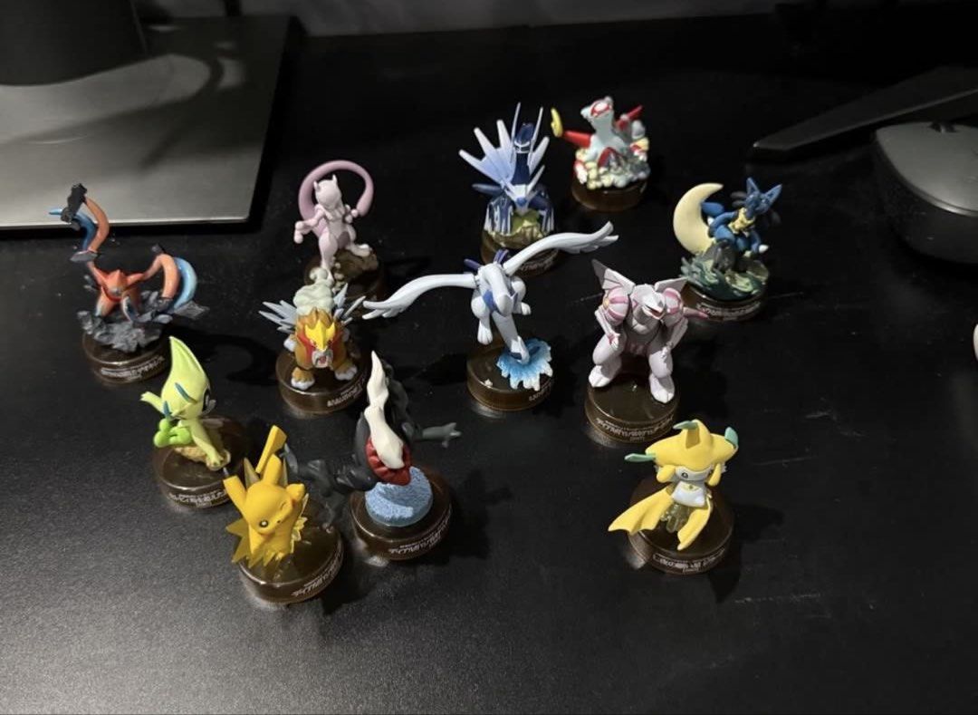Pokemon Kaiyodo Bottle Cap - Action Figure Set (Category: Character Goods) located in Rodriguez. Submitted by babytoothy (Listing ID 1463169667, Image 2). Description: 12 pcs -Pikachu -Darkrai -Lugia -Deoxys -Celebi -Jirachi -Latias -Entei -Mewtwo -Palkia -Dialga -Lucario Very good condition.
