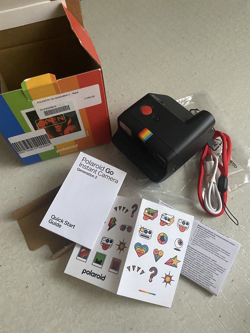 Polaroid Go Generation 2 Instant Camera - Black (Category: Cameras) located in Muntinlupa City. Submitted by nn.collection (Listing ID 1463190337, Image 1). Description: - Polaroid Go Generation 2 instant camera in black - Comes with original box, quick start guide, stickers, and charging cable - Ready to capture memories - Great for parties and everyday fun - No film included. - Still negotiable - Location: Muntinlupa City.