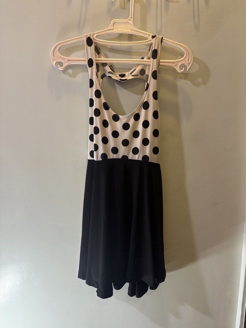 Polka Dot & Black Cut-out Back Dress (Category: Dresses) located in Valenzuela. Submitted by roxie018 (Listing ID 1463304601, Image 1). Description: - Adorable black and white polka dot top - Features a stylish cut-out detail at the back - Flattering tie-up detail at the waist - Contrasting plain black skirt - Versatile for casual outings or parties - Effortless to style.
