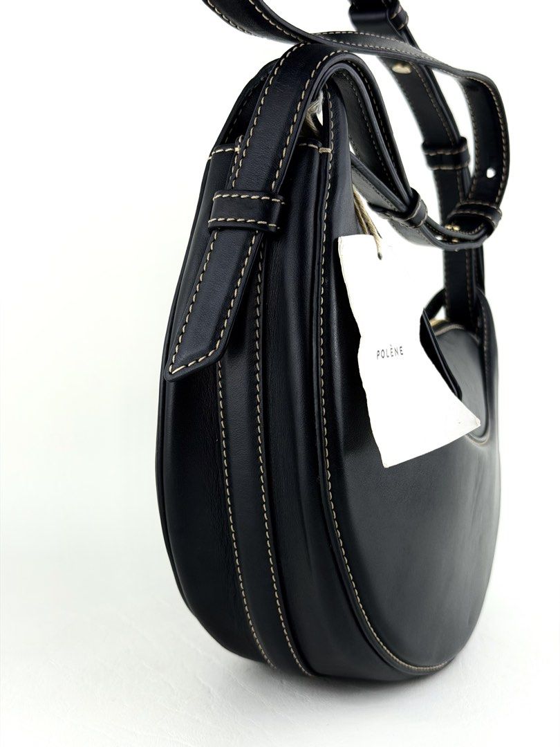 POLÈNE Numéro Dix (Category: Luxury Bags & Wallets) located in Manila. Submitted by luvluxe.mnl (Listing ID 1463259624, Image 3). Description: In smooth black Small size Comes with its extra strap Two way- crossbody or shoulder bag With minimal signs of use seen on pic— crease at the back & penmarks inside But overall in very good condition; No functionality issue Still presentable 😍 Must have!!! .