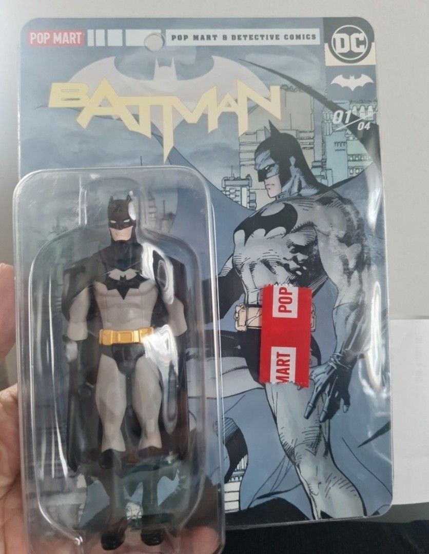Pop Mart Batman Detective Comics Action Figure (Category: Figurines & Statues) located in Taguig. Submitted by gowilliam.767 (Listing ID 1463261241, Image 1). Description: - Pop Mart Batman Action Figure - From Detective Comics - Brand new in original packaging - Features Batman in his classic grey and black suit with yellow belt - Packaging includes Batman artwork - Ideal for Batman fans and collectors.