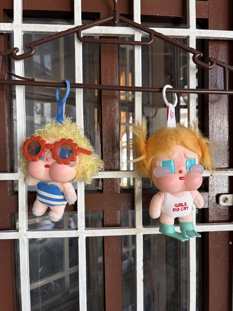 Pop Mart Crybaby Vacation Mode On Keychain Set (Category: Designer & Blind Box Toys) located in Las Pinas. Submitted by celly_belly (Listing ID 1463181470, Image 1). Description: - GET BOTH FOR 1K - SRP for one is 1150 - Keychain 1: Sunbathing - Keychain 2: Glug-glug - Both keychains have original tags attached - Comes with a complimentary white drawstring bag.