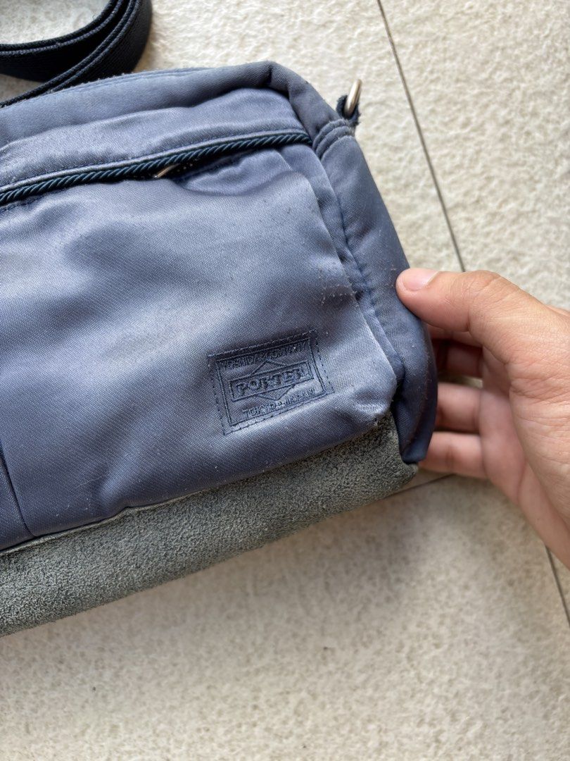 PORTER YOSHIDA CROSSBODY BAG (Category: Cross-body Bags) located in San Pedro. Submitted by wharfthrift (Listing ID 1463190368, Image 2). Description: FOR SALE ‼️ Porter Yoshida Shoulder Bag Good condition 8/10 ISSUE: lint in front of the bag ₱990 + SF shipping via lalamove or j&t meetup around san pedro laguna or muntinlupa.