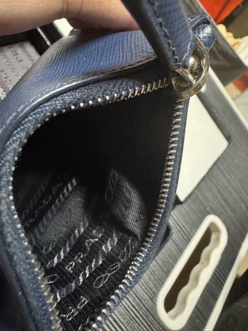 Prada Coin Purse / Card Holder (Category: Luxury Bags & Wallets) located in Davao. Submitted by nomadfits (Listing ID 1463249980, Image 3). Description: Decluttering some personal items Location: Davao All items plus sf via lbc Includes box.