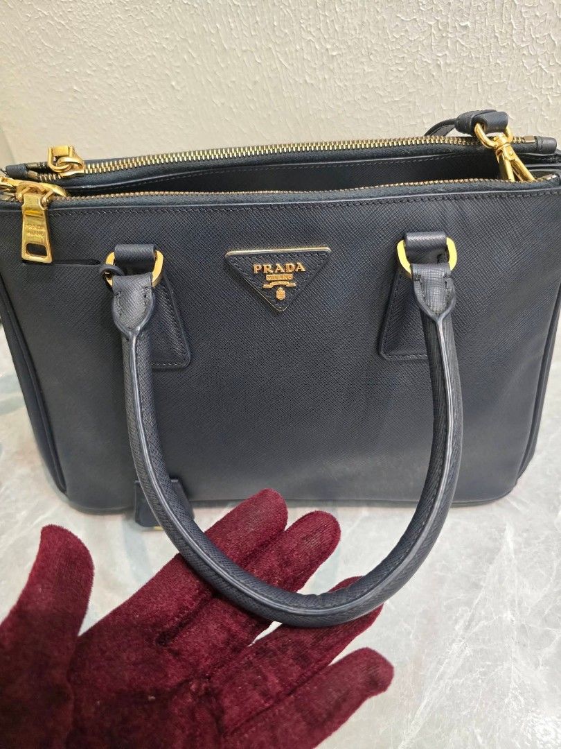 Prada Galleria 2-Way Bag (Category: Luxury Bags & Wallets) located in Manila. Submitted by ej.collections (Listing ID 1463288960, Image 3). Description: NEGOTIABLE PRICE ALL ITEMS ARE ONHAND 💯 GUARANTEED AUTHENTIC MONEY BACK IF PROVEN FAKE •Size: Small •Condition: Good •Inclusion: Bag only with generic dustbag •Plus shipping fee •Local & international shipment 📍Loc. Davao City.