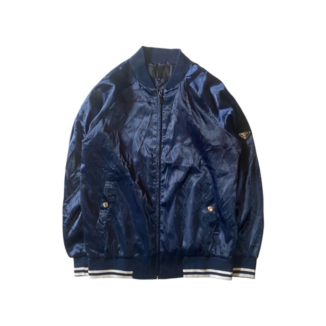 Prada Navy Bomber Jacket (Category: Coats, Jackets and Outerwear) located in Manila. Submitted by finofindthisart (Listing ID 1463240993, Image 1). Description: Length 27 Width 22 Measured it by inches P1499 Issue: N/A This is a pre-loved/thrifted items and may show minor signs of issue due to its vintage nature. Kindly manage expectations. No refunds or exchanges will be accepted. 📍Pasay City DM for inquiries..