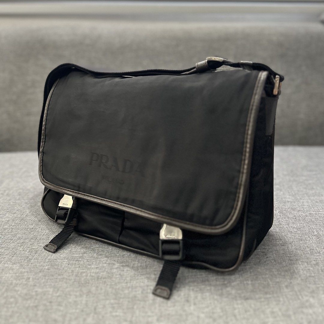 Prada Nylon Messenger Bag Black (Category: Sling Bags) located in Tanza. Submitted by edzelg5r62292 (Listing ID 1463173743, Image 2). Description: Dimensions: Length: 11 inches Width: 12.5 inches 9.5/10 condition normal signs of use missing tags what you see is what you get with provided dustbag.