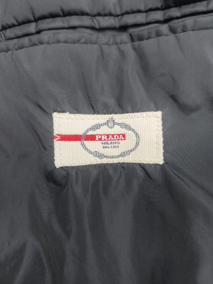 PRADA nylon padded (💯 authentic) (Category: Coats, Jackets and Outerwear) located in Baguio. Submitted by archival_thrifted.ph. (Listing ID 1463219959, Image 2). Description: FOR SALE ‼️ .PRADA NYLON PADDED BLAZER . EXCELLENT CONDITION .💯 AUTHENTIC .SIZE 50 ON TAG .PHP 4580 PLUS SF .❌❌ COP/COD .MOP GCASH .COURIER J&T .BAGUIO AREA .DM FOR SURE BUYER TY.