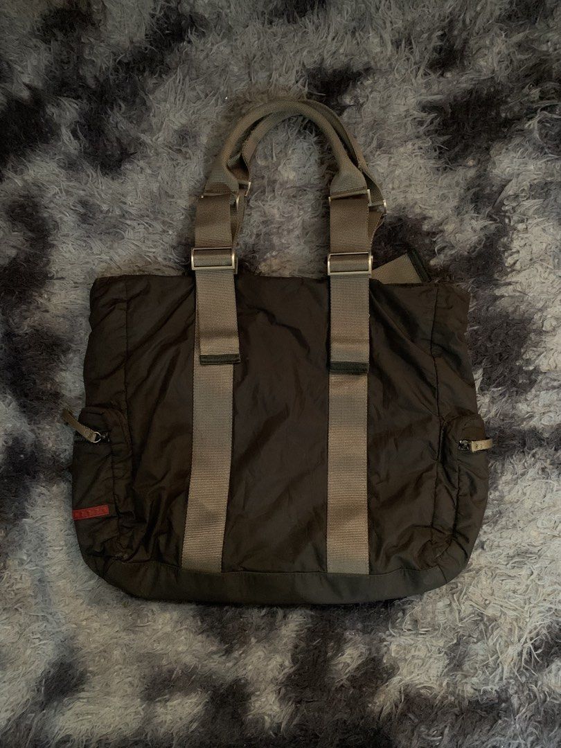 Prada Nylon Totebag (Category: Tote Bags) located in Manila. Submitted by etchelverano (Listing ID 1463200545, Image 1). Description: Prada Tote Bag Excellent condition No issue Color rate 10/10.