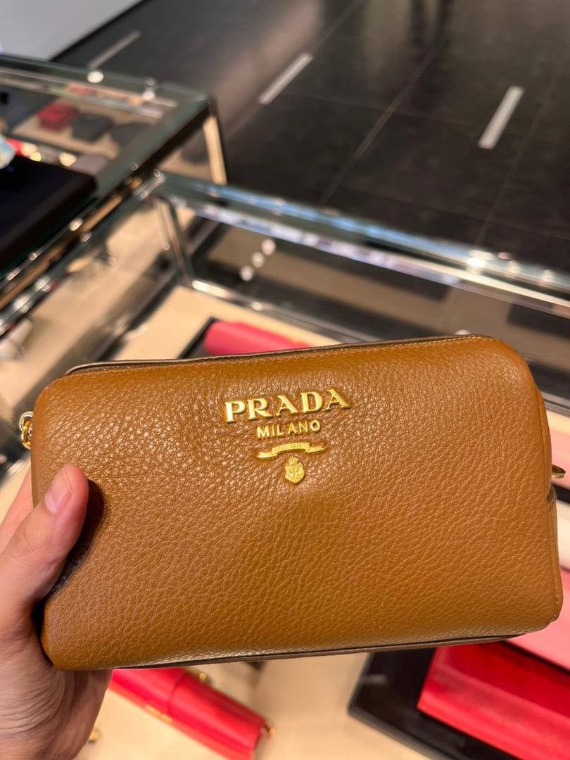 Prada Pouch (Category: Luxury Bags & Wallets) located in Manila. Submitted by JustLuxPH (Listing ID 1463169172, Image 2). Description: 🇵🇭 On Hand PH 😍 Super nice in actual 💯 Original 🔹Actual photos are posted. ✅ Pouch convertible into a sling bag. ✅ Comes complete with 3rd Party Chain. ✅ 2 pcs available in stock 🏦 MOP: BDO, BPI, GCASH 🔸 Price is negotiable 📌 Justluxph is not affiliated with any brands featured. All copyrights remain sole 