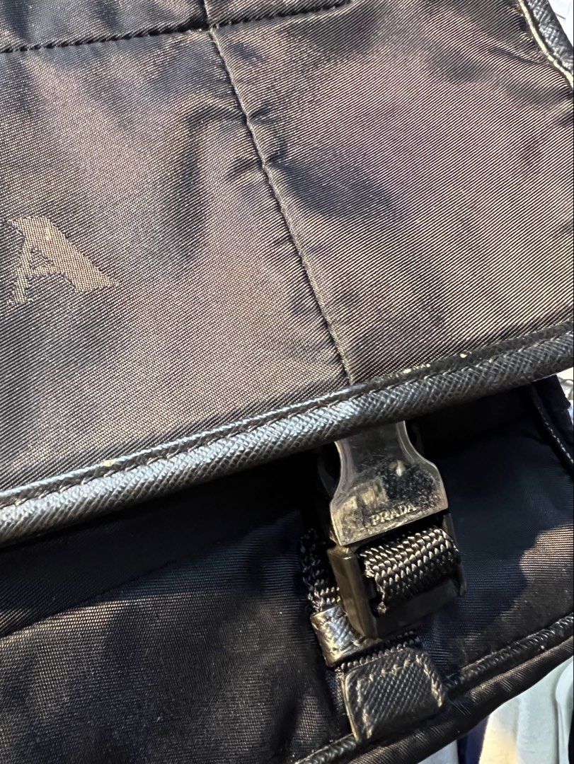 Prada Quilted Tessuto Nylon Messenger Bag (Category: Luxury Bags & Wallets) located in Alcala. Submitted by capnbagseller (Listing ID 1463259819, Image 2). Description: Prada Quilted Tessuto Nylon Messenger Bag Issue Seen on Front Flap loose stitch Baguio City Loc.