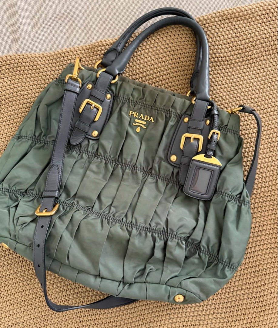 Prada Tessuto Gaufre Hobo Bag Green (Category: Luxury Bags & Wallets) located in Manila. Submitted by jwsb_ (Listing ID 1463184822, Image 1). Description: - Authentic Prada bag - Lovely green color - Signature ruched nylon and leather details - Detachable shoulder strap - Leather tag included - Gold-tone hardware - Spacious interior - Perfect for everyday or special occasions.