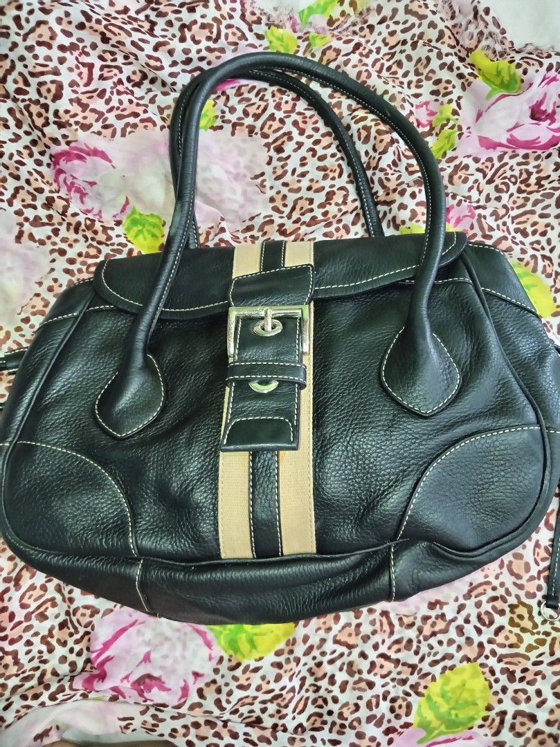 Prada Vitello Daino stripe (Category: Luxury Bags & Wallets) located in Malolos. Submitted by shoptokyothrift (Listing ID 1463203533, Image 1). Description: Lampo zip With white tag PRADA Vintage Leather Stripe Top Handle Bag Pre-loved/vintage condition. Shows signs of age and use, Made in Italy. As is Please see all photos carefully. Japan sourced.