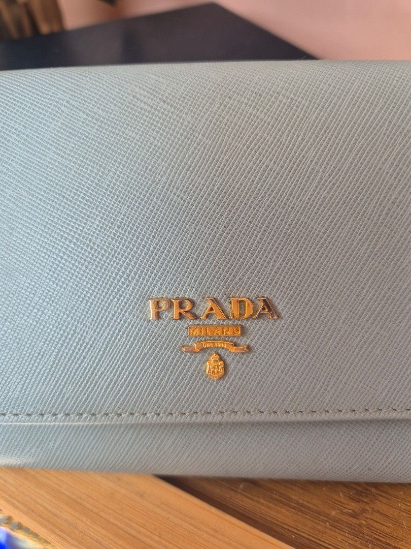 Prada wallet sling (Category: Luxury Bags & Wallets) located in Lapu Lapu. Submitted by ej882019 (Listing ID 1463125320, Image 2). Description: check all the details.