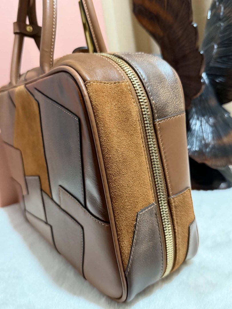 Preloved Leather Patchwork Beau (Category: Luxury Bags & Wallets) located in Manila. Submitted by bagsandmanymanymore1 (Listing ID 1463247101, Image 3). Description: Preloved Miumiu Patchwork Beau Bag Lambskin leather Size 34cm(L) x 23cm(H) x 10cm(W) Leather handle Gold-toned hardware Zipper closure RiRi zipper Patchwork workmanship .