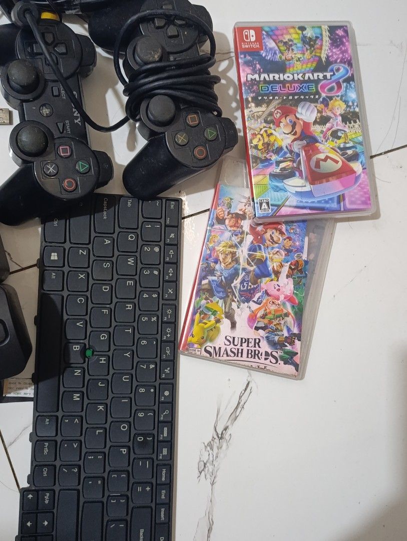 PS2/PS3 Controllers, Switch Game Cases, T440p Keyboard, Speakers, Gun controller (Category: Controllers) located in Naga. Submitted by brightsideofthemoon (Listing ID 1463139118, Image 3). Description: take all. fixed price. t440p keyboard untested found with parts bundle. controllers working. speakers working. Cases only..