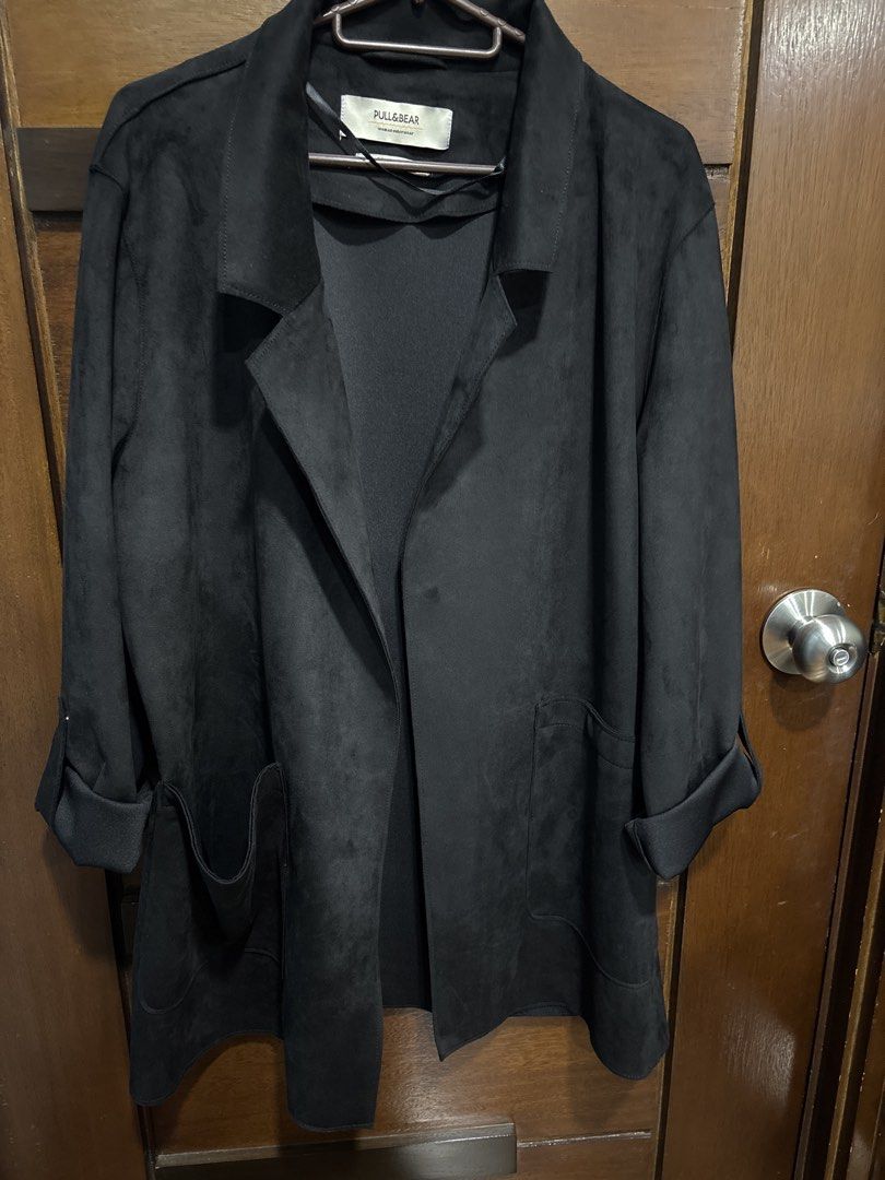 Pull & Bear Black Suede Open Front Jacket (Category: Coats, Jackets and Outerwear) located in Mandaluyong City. Submitted by clothescarousel (Listing ID 1463260455, Image 1). Description: - Black suede-like jacket from Pull & Bear - Open front style with lapels - Cuffed sleeves - Two front pockets - Ideal for layering over any outfit - Made in China.