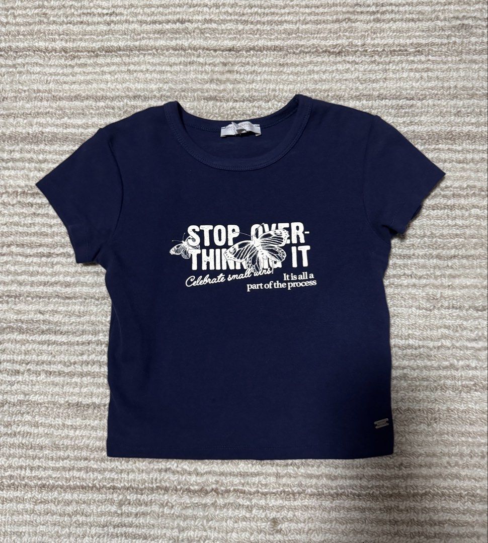 Pull&Bear Navy Graphic Baby T-shirt (size S) (Category: Shirts) located in Manila. Submitted by haobinz_01 (Listing ID 1463258834, Image 1). Description: - Navy blue baby T-shirt from Pacific Republic - Graphic print on front -Fitted style - Made in Morocco - Size: S.