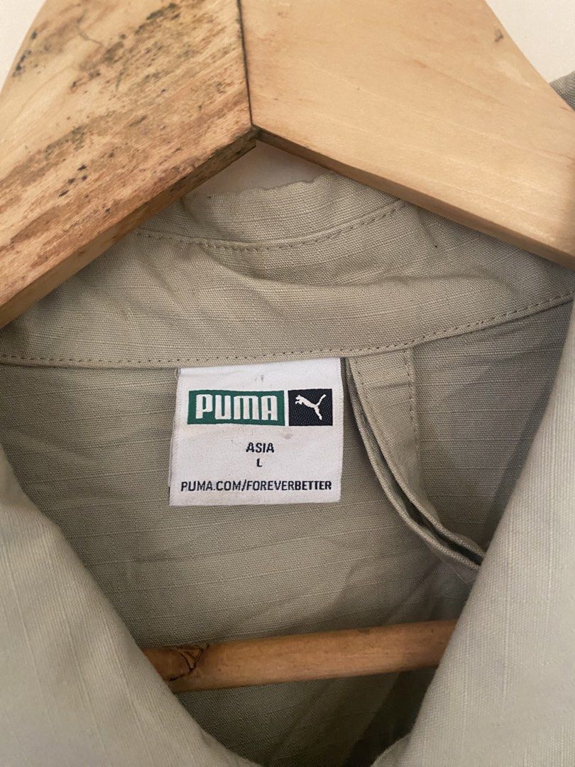 Puma Coach Jacket Beige Size L (Category: Coats, Jackets and Outerwear) located in Bocaue. Submitted by pards23 (Listing ID 1463322735, Image 3). Description: - Lightweight coach jacket - Color: Beige - Classic Puma logo on chest - Button-up front - Features pockets - Ideal for layering - Size: L (Asia fit) Dimes W23 L27 Color rate 9.8/10 Condition Excellent No issue Needwash .