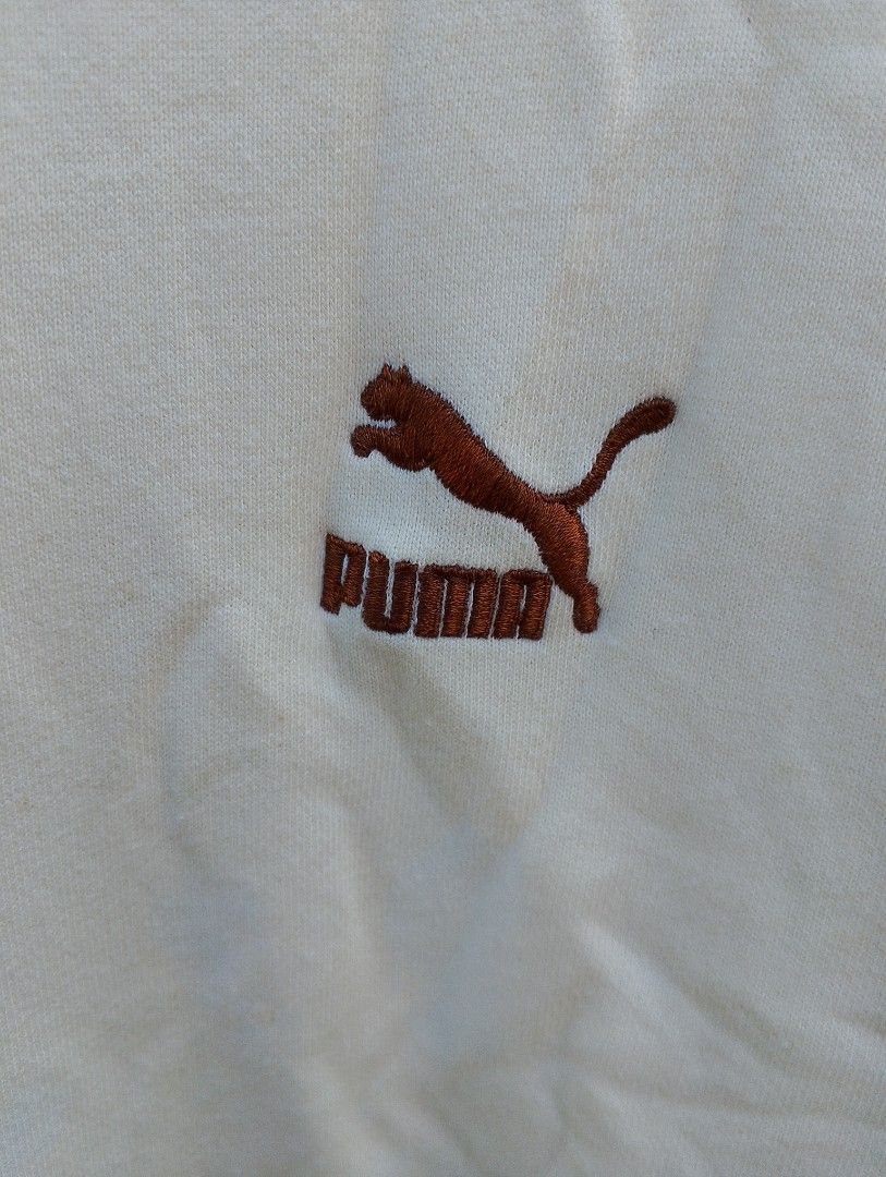 Puma Men's Classics Pullover Hoodie (Category: Coats, Jackets and Outerwear) located in Baliuag. Submitted by retrovault83 (Listing ID 1463323946, Image 3). Description: ✨ Condition: 9.5–10/10 – Excellent Preloved Condition 📏 Measurements (Flat Lay, Tagged Size L): • Width: 24 • Length: 28 ✅ Condition Notes: • No holes • No stains • Embroidered Puma logo intact • Original drawstrings included • No major flaws • Ready to wear 📍 Location: Baliuag