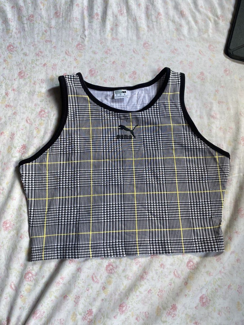 Puma Plaid Cropped Tank Top Size M (Category: Activewear) located in Banna (Espiritu). Submitted by zhylll (Listing ID 1463172414, Image 1). Description: - Puma cropped tank top - Black, white, and yellow plaid pattern - Sleeveless with black trim - Perfect for casual outfits or layering.