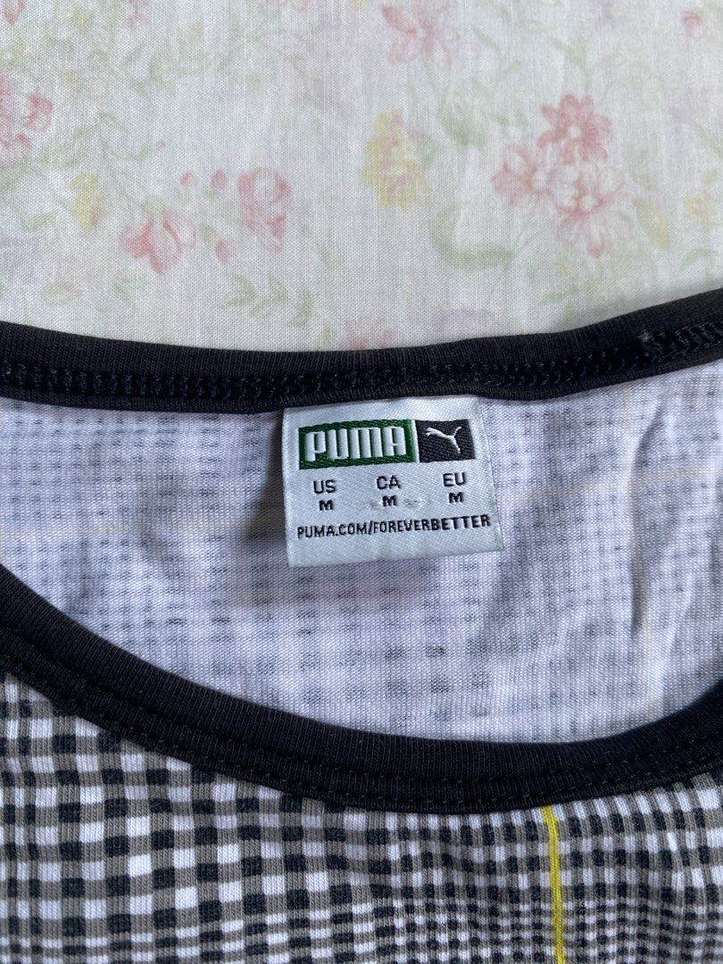 Puma Plaid Cropped Tank Top Size M (Category: Activewear) located in Banna (Espiritu). Submitted by zhylll (Listing ID 1463172414, Image 2). Description: - Puma cropped tank top - Black, white, and yellow plaid pattern - Sleeveless with black trim - Perfect for casual outfits or layering.