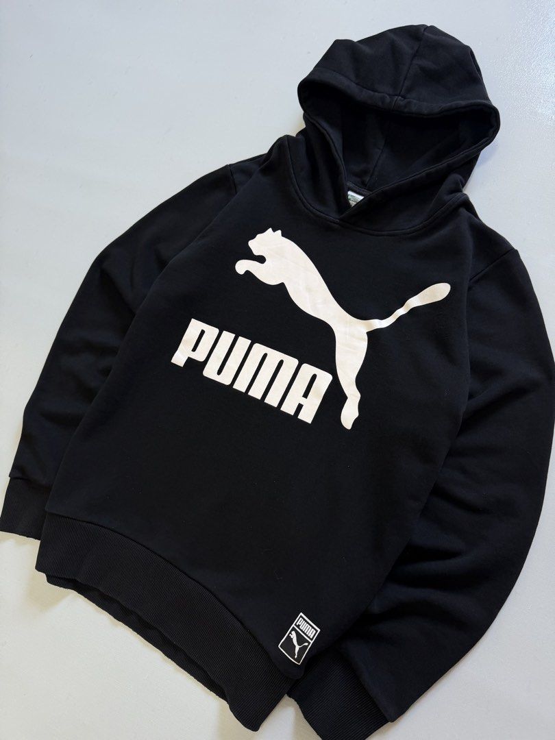 Puma Pull Over Hoodie Jacket (Category: Coats, Jackets and Outerwear) located in Cavite. Submitted by chooseyouroutfit (Listing ID 1463130678, Image 3). Description: Puma Pull Over Hoodie Jacket Length - 24.5 Width - 19.5 Black na black pa yung color Have big logo in front Issue: missing lace only Check detailed pictures .