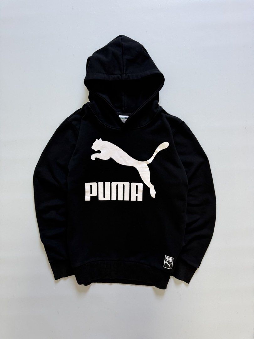 Puma Pull Over Hoodie Jacket (Category: Coats, Jackets and Outerwear) located in Cavite. Submitted by chooseyouroutfit (Listing ID 1463130678, Image 2). Description: Puma Pull Over Hoodie Jacket Length - 24.5 Width - 19.5 Black na black pa yung color Have big logo in front Issue: missing lace only Check detailed pictures .