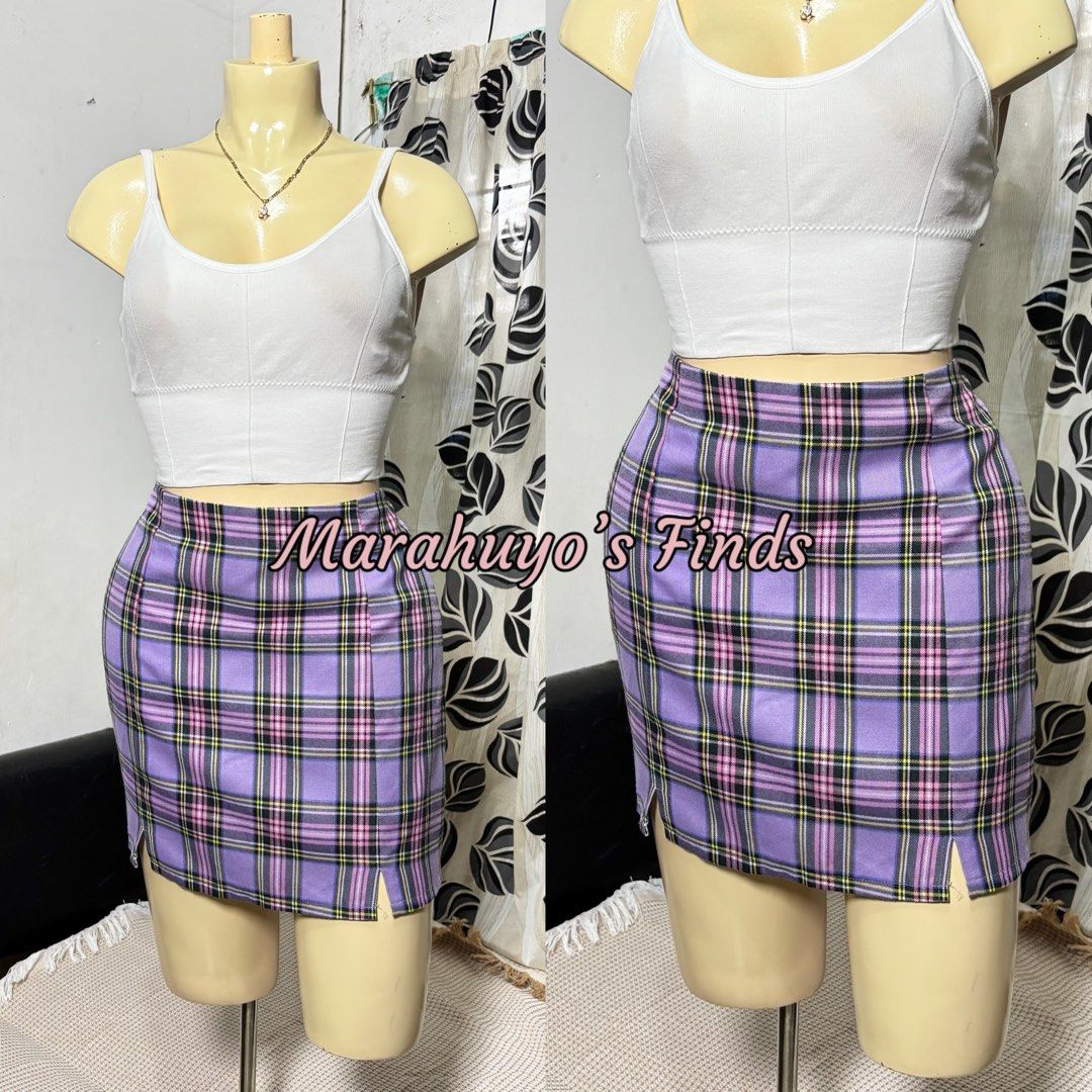 Purple Plaid Mini Skirt with Side Slits (Category: Skirts) located in Mabalacat. Submitted by marahuyos.finds (Listing ID 1463232148, Image 2). Description: - Cute purple plaid mini skirt - High waist design - Flattering fit - Small slit on each side - Versatile for casual outings or nights with friends - Pairs well with crop tops or fitted tees.