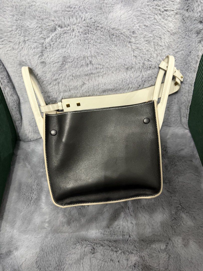RABEANCO Two-tone Leather Handbag with Shoulder Strap (Category: Shoulder Bags) located in Paranaque City. Submitted by hamcynn (Listing ID 1463321640, Image 1). Description: Letting go of what I don’t use anymore. This was a handbag purchased in 2024. Very seldom used, maybe less than 5x. I prefer bigger bags, backpack. Super impulsive purchase in Telford Plaza during my walk going to Kowloon Bay Station, HK. .