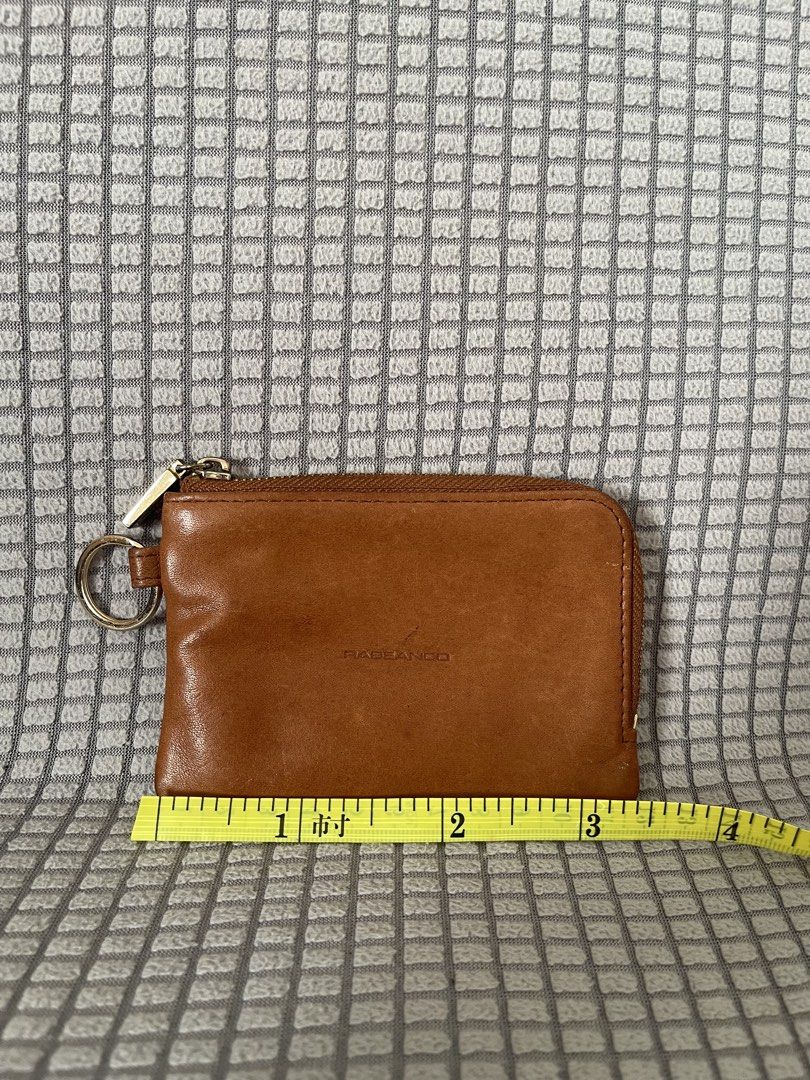Rabeanco wallet L zip (Category: Wallets & Card Holders) located in Manila. Submitted by dstrangerthings (Listing ID 1463226372, Image 2). Description: ✅selling it at a very low price 🙋🏻‍♀️ slight discoloration on zipper handle but does but affect the zipper. .