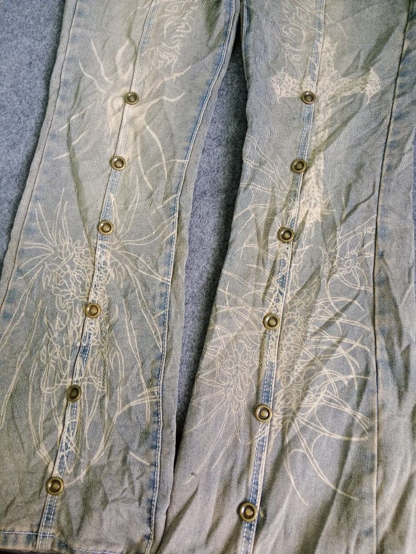 Random Wash Flare Y2K Jeans with Button Detail (Category: Jeans) located in Alburquerque. Submitted by romnickhatosa (Listing ID 1463177334, Image 3). Description: Cool vintage wash flare jeans with unique all-over graphic print and front button details. Perfect for a statement outfit!.