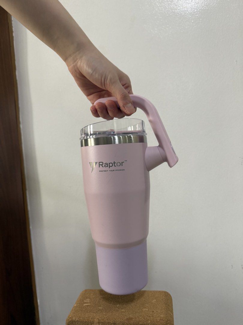 Raptor Drinkware Twist Tumbler 32oz (Category: Water Bottles & Tumblers) located in Quezon City. Submitted by sweetcaroline101010 (Listing ID 1463214558, Image 1). Description: - Color: Lavender - SRP: 990 - Complete set with straw - Twistable handle - Insulated.